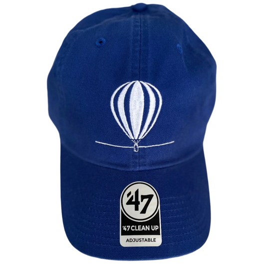 Front view of the Seymour Wine Co. 47 Brand Clean Up hat, the perfect accessory for enjoying wine this summer, featuring a relaxed fit, adjustable strap, and embroidered logo for wine enthusiasts.